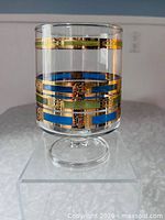 Front view of Culver Empress footed glass showing full pattern and pedestal base