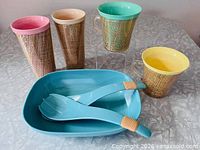 overview of all seven pieces: bowl, utensils, two tumblers, two mugs