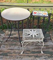 All three accent tables grouped: round mosaic table, square fruit tile table, white metal plant stand