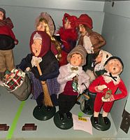 Group shot showing seven Byers' Choice figurines