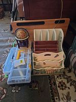 Group showing battery cases, globe, tray table, magazine racks and organizers