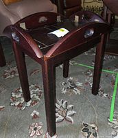 Butler table standing with drop edges raised