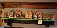 Full shelf showing all miniature cottages