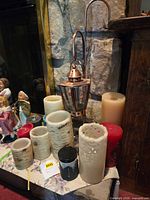 Group shot showing lantern and assorted candles