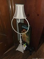 All three items: lamp, Coca-Cola tray, cast iron dog