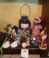 Group shot of all Christmas decor items on shelf