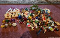 Wide shot of entire assortment spread on carpet