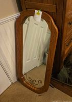 front view of oak framed mirror