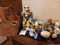 overall lot with eggs, chicks, wooden basket, duck