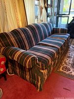 Front angle view showing full sofa and upholstery