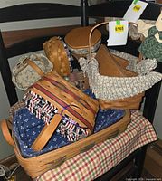 Grouping of Longaberger baskets with various liners and fabric angels