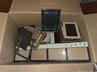 Top view of box showing all assorted frames including collage frame and sentiment frame