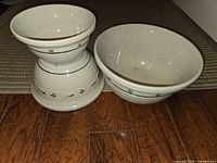 All three stacked bowls showing exterior decoration