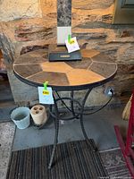 Oblique view of table showing slate top and surrounding area