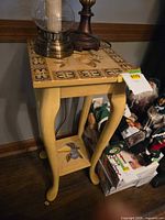 Full view of table showing height, legs, lower shelf