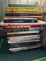 Full stack of books showing spines for title verification