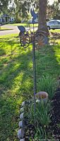 Entire weathervane stake with bird finial and directional letters