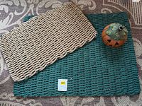Top view showing both rope doormats and pumpkin