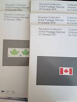 Front covers of all five Canada Post Souvenir Collection books, partial overlap shows years 1977-1980 and 1982