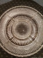 Top view of entire cut crystal serving platter showing four outer sections and center bowl