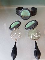 Full view of cuff bracelet and both earrings