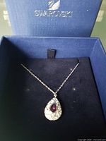 Necklace displayed inside Swarovski box
