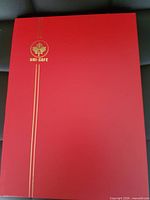 Front cover showing Uni-Safe logo and red hardcover