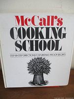 Front cover of McCall's Cooking School Volume 3 binder