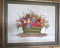 Frontal view of framed crewel embroidery