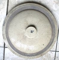 Top view of stoneware crock lid showing knob handle and overall glaze