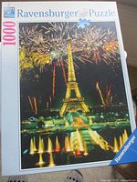 Front of sealed Ravensburger Celebrating Paris 1000-piece puzzle box