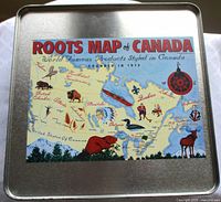 Square metal tin showing Roots Map of Canada puzzle artwork