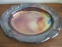 Full view of oval silver-plated tray front
