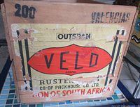 End view showing VELD paper label and branding details