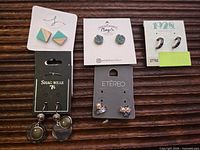 All five earring pairs on display cards