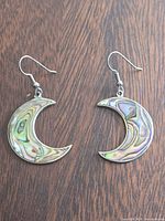 Front view of both crescent moon abalone inlay earrings showing design and condition