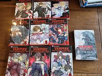 All ten Vampire Knight books laid out, volumes 1-9 and Fleeting Dreams visible