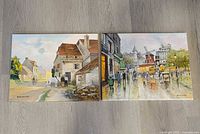 Both paintings side by side displaying full artwork