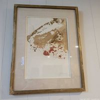 Full view of framed abstract painting with signature visible