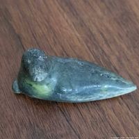 Top view of soapstone seal figurine showing overall shape and color