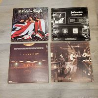 Front covers of four albums