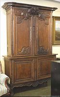 Full view of the antique French deux corps hutch showing upper and lower sections
