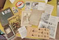 Group view of magazines, brochures, illustration, stamp album page