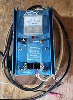 Front view showing Newmar Nautilus-8 charger with ammeter, controls and terminals