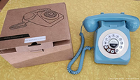 Phone front and box showing style and packaging