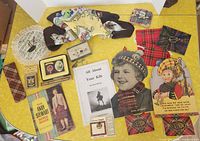 Overview of all Scottish ephemera on yellow table
