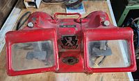 Front view of Wolf TG60 bench grinder showing dual eye shields and overall condition