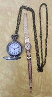 Both watches side by side showing size and chain