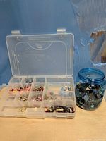 Organizer and blue jar side by side showing quantity of beads
