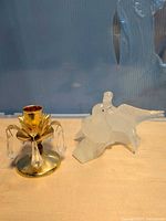 Overall view of candle holder and two onyx doves